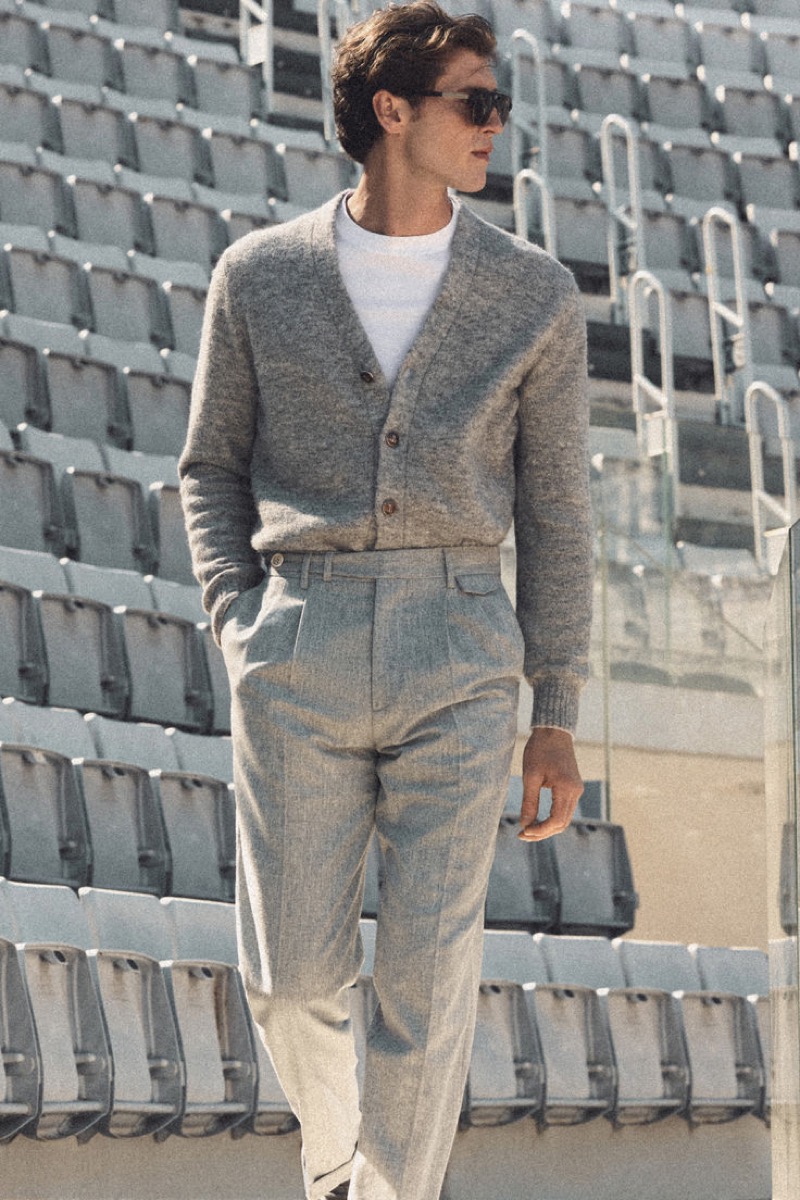 Jacques Saayman inspires in a Brunello Cucinelli cardigan tucked into pleated trousers.