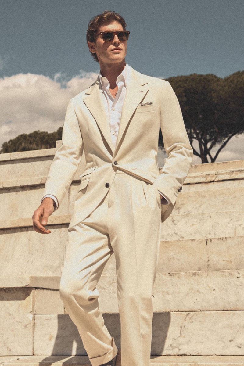 Brunello Cucinelli makes an elegant statement with its beige Garbardine suit. 