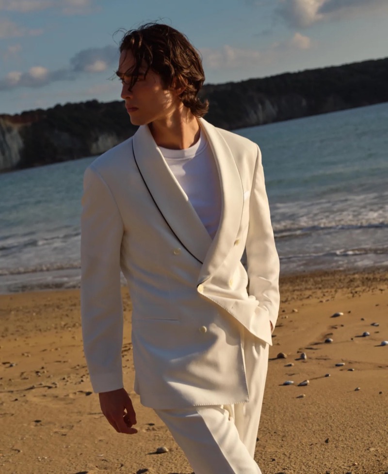 A striking white double-breasted suit from Brunello Cucinelli’s summer 2024 collection makes a sartorial statement.