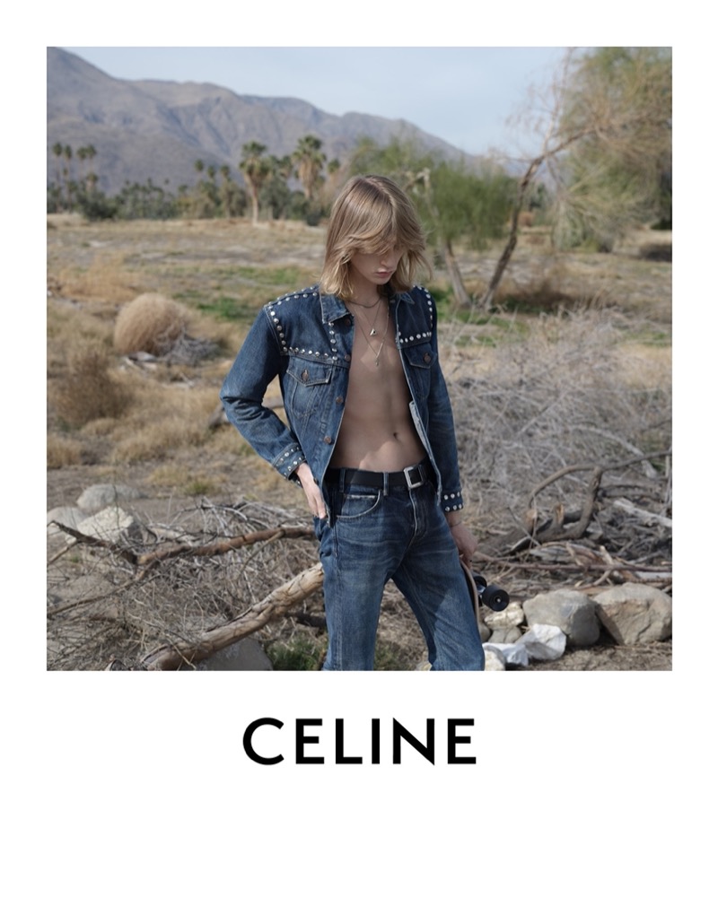 In Celine’s summer 2024 campaign, Fisher exudes effortless cool in studded denim amidst a rugged landscape.