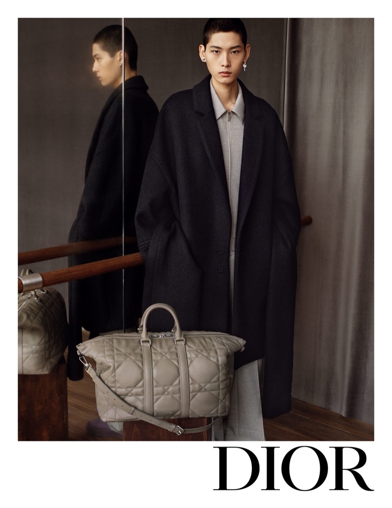 Dugyeong Kim dons an oversized coat for Dior Men’s winter 2024 campaign. 