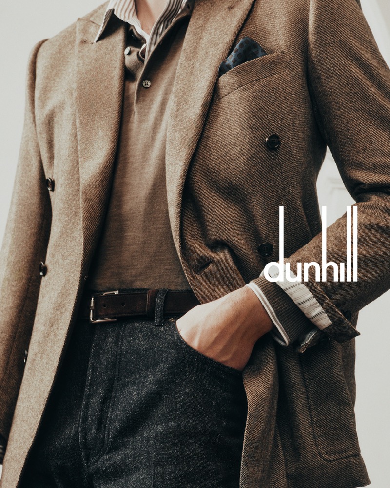 A close-up highlights the essence of British elegance with Dunhill’s impeccably tailored blazer and sophisticated layering.