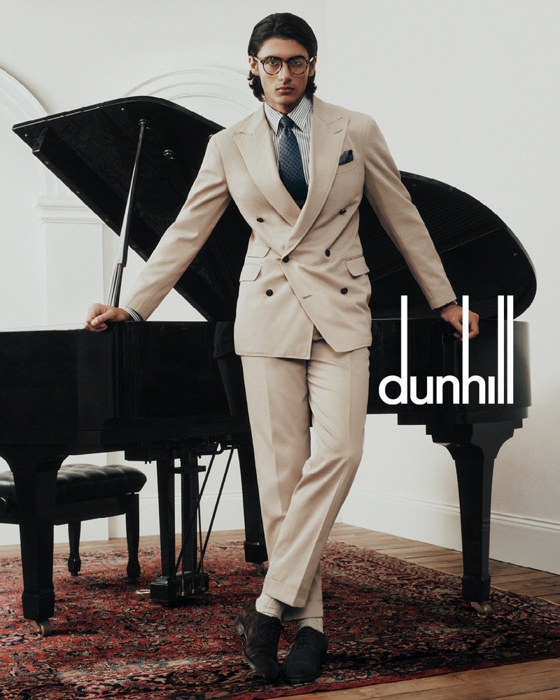 Besides a grand piano, Akbar Shamji showcases Dunhill’s fall-winter 2024 collection in a double-breasted suit.