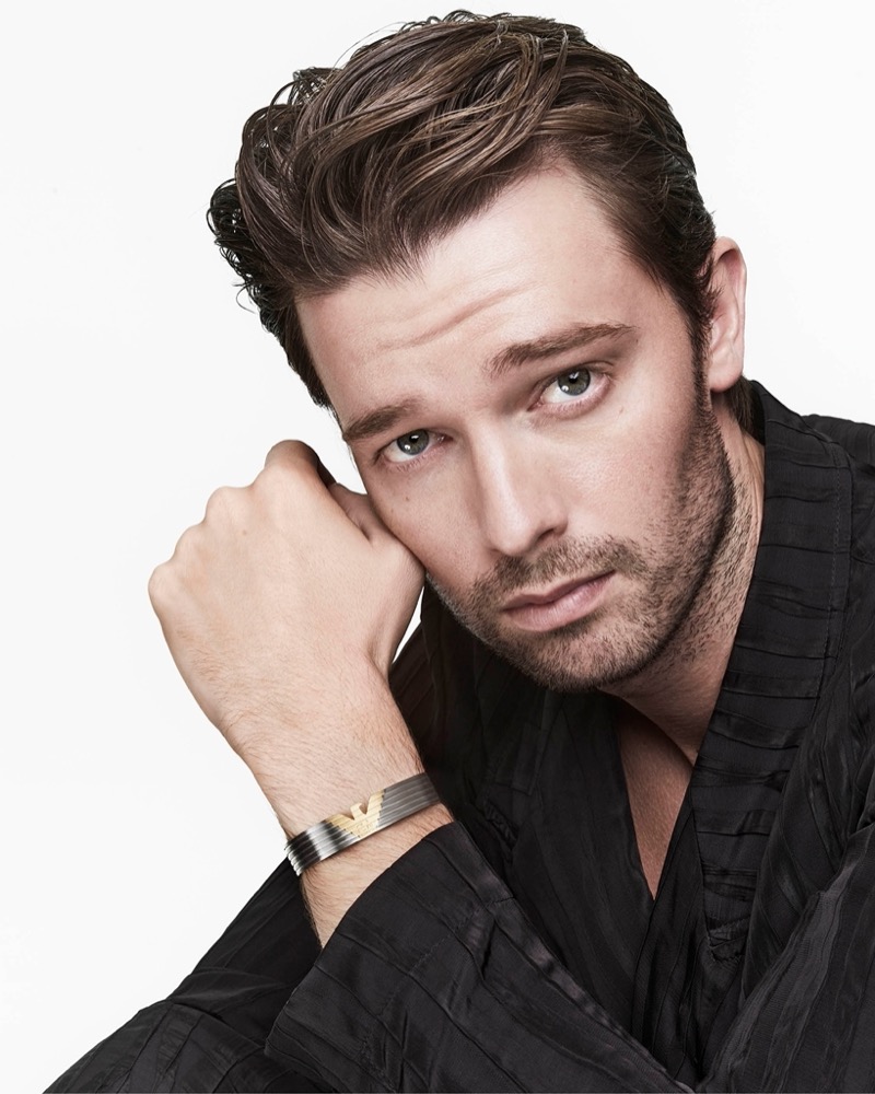 Sporting a cuff bracelet, Patrick Schwarzenegger fronts Emporio Armani’s summer 2024 accessories advertisement.