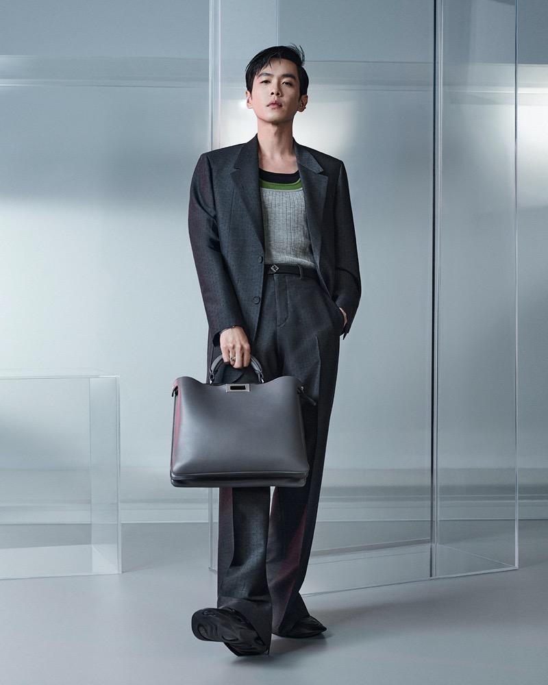 Zhang Ruoyun epitomizes elegance in a tailored suit, carrying a Peekaboo leather bag in Fendi’s fall-winter 2024 ad.