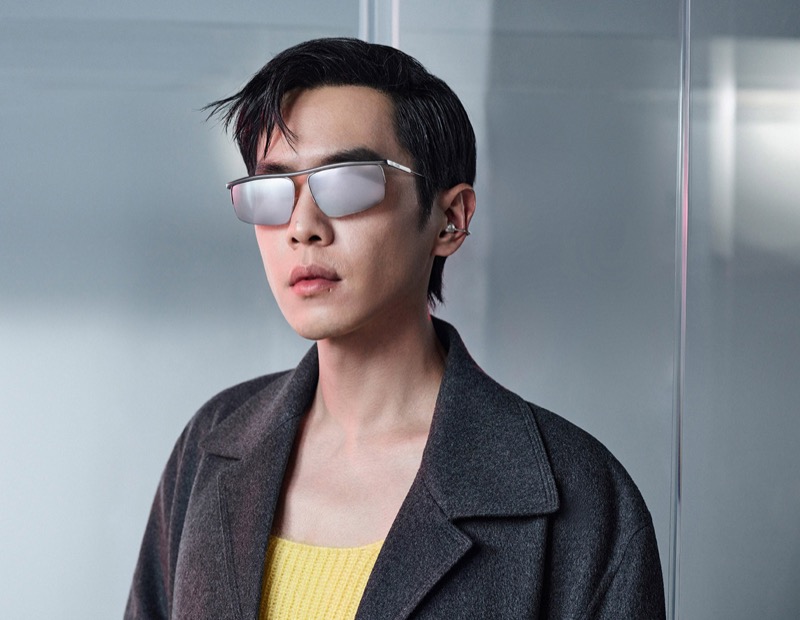 Chinese actor Zhang Ruoyun sports sunglasses and a chic grey coat for Fendi’s fall-winter 2024 campaign. 