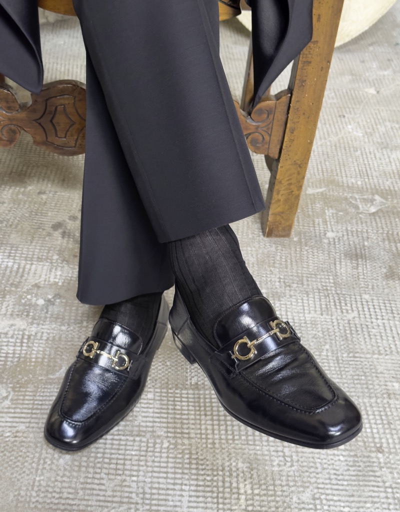 Ferragamo highlights its leather loafers. 