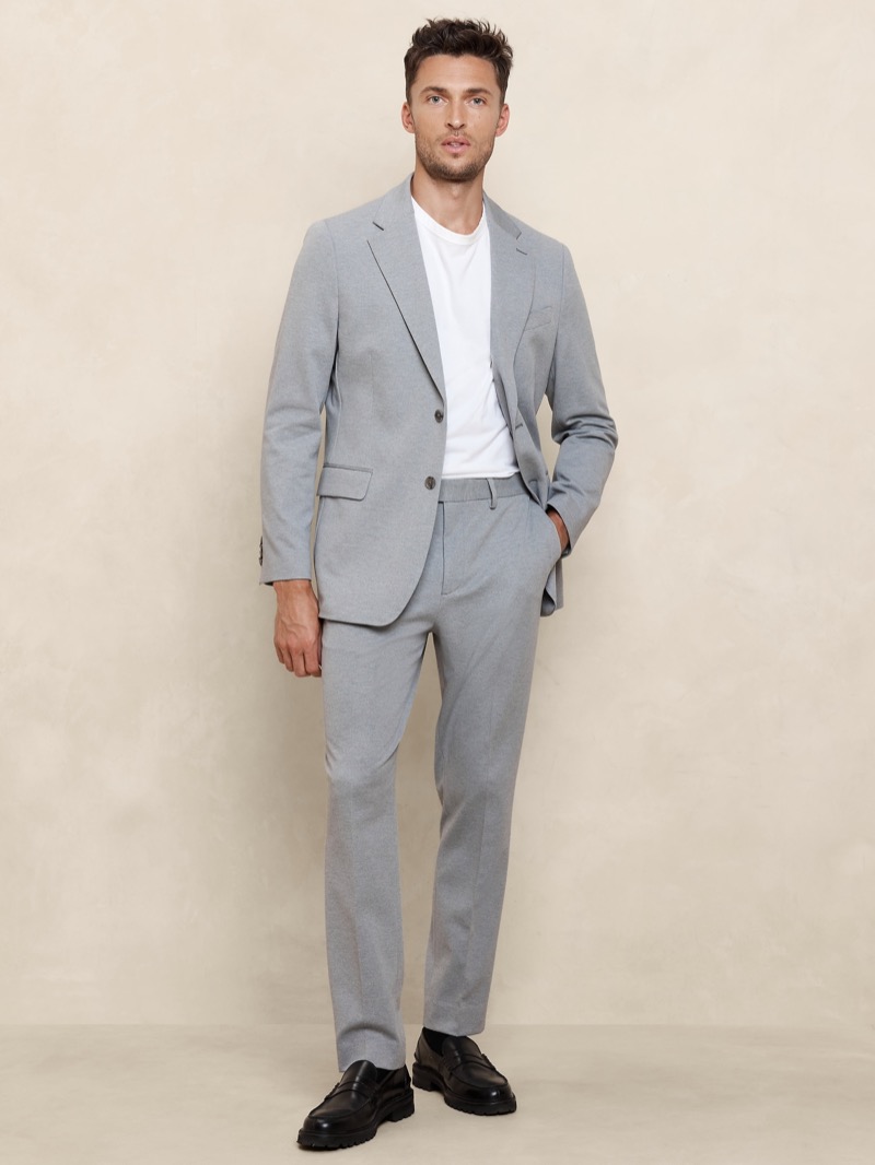 Effortlessly blend casual and chic with a grey knit suit and classic white T-shirt.