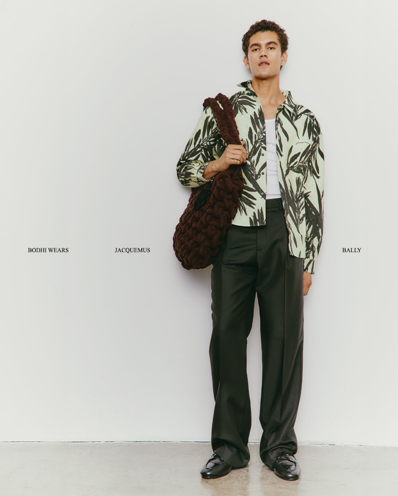 Bodhi Heeck models a JACQUEMUS shirt with a JW Anderson bag and Bally loafers.