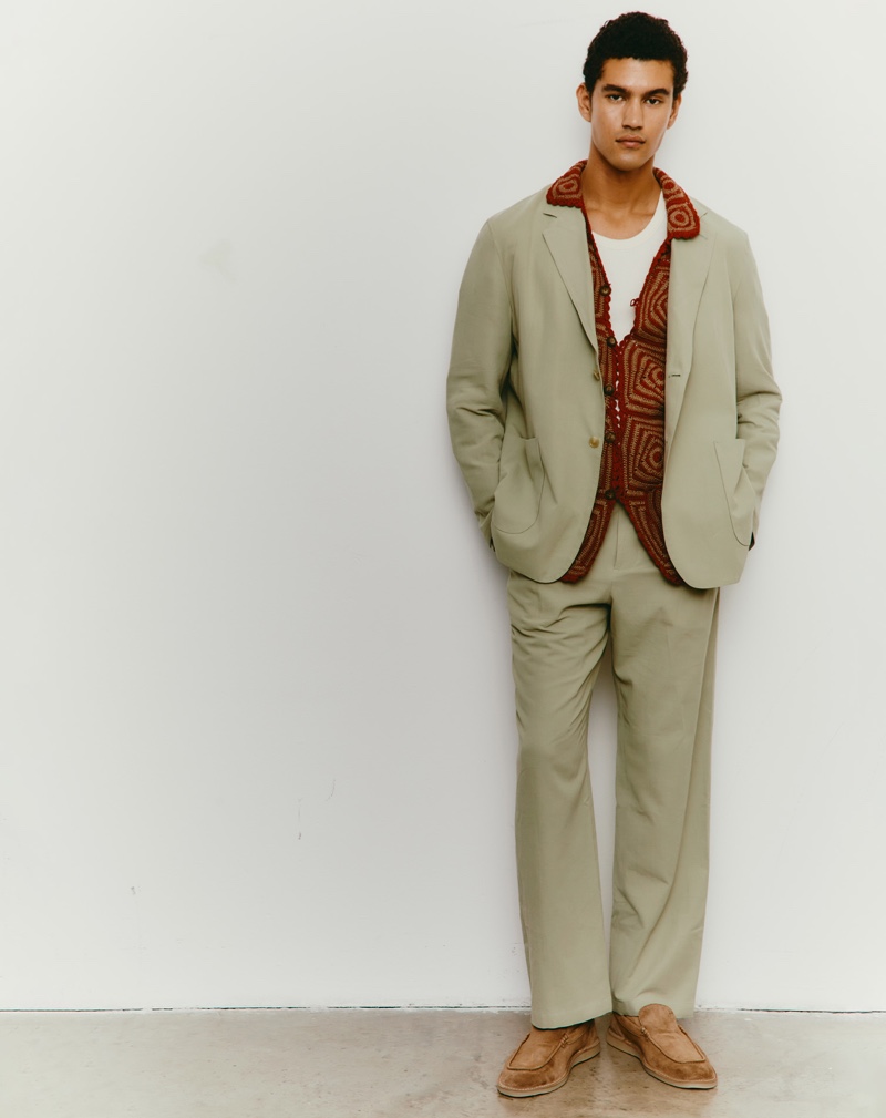 The crochet trend transitions into fall with an overshirt by Baziszt, worn with an Auralee suit and Dolce & Gabbana loafers.