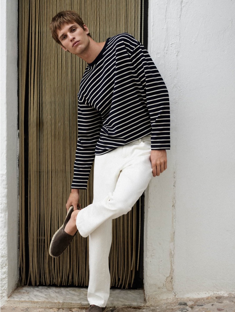 Nautical style meets comfort as Yeray Allgayer models Massimo Dutti’s striped top and crisp white pants with espadrilles. 