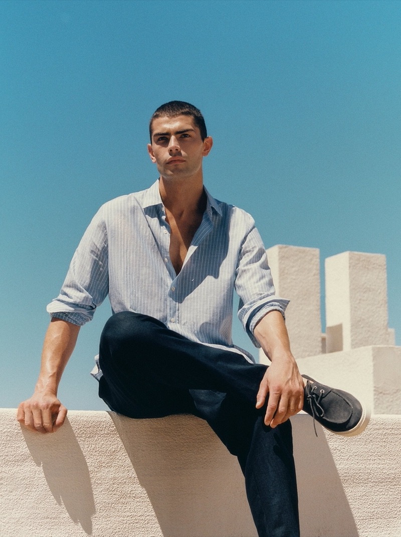 Wearing a striped linen shirt, Charlie Knepper fronts Massimo Dutti’s nautical summer outing.