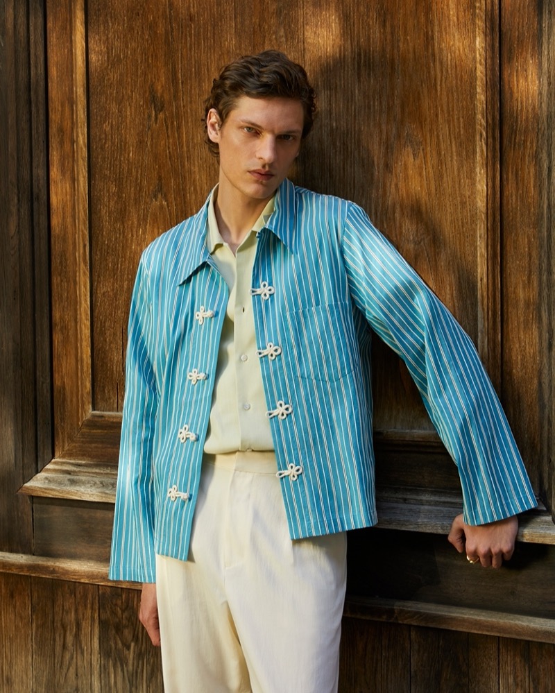 Valentin Caron brings a touch of classic style with a striped Bode shirt paired with pieces by Loro Piana and Auralee. 