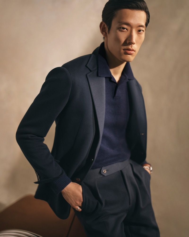 Juhyung Kang exudes confidence in a navy ensemble from Polo Ralph Lauren’s pre-fall 2024 collection. 