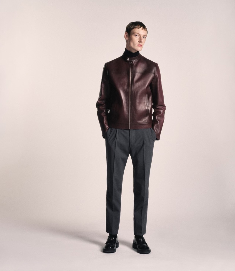 Roberto Sipos captures attention in Prada’s leather jacket and trousers for its Made to Measure campaign.