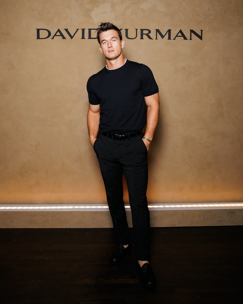 Reality TV star Tyler Cameron goes classic in an all-black outfit for David Yurman’s 2024 campaign event.