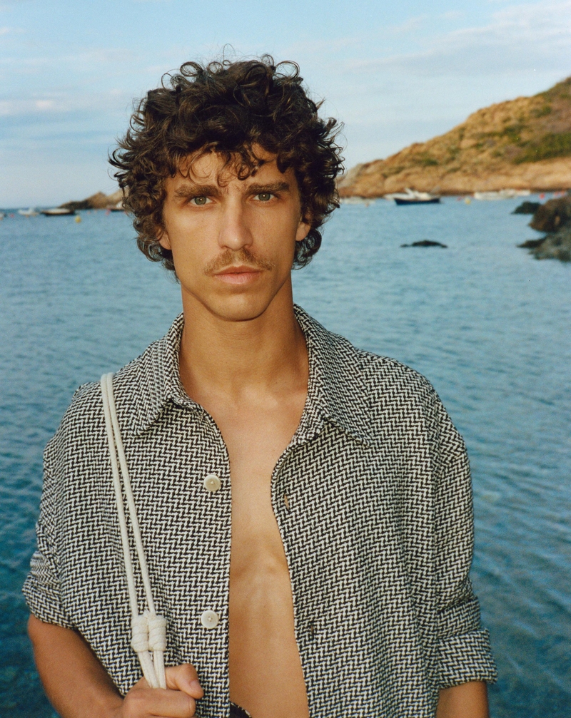 By the waterfront, Grzegorz Chanko showcases a textured overshirt.