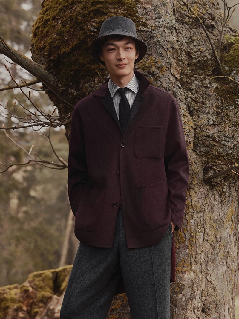 Burgundy complements Canali’s chic grey color palette as featured in its fall-winter 2024 campaign.