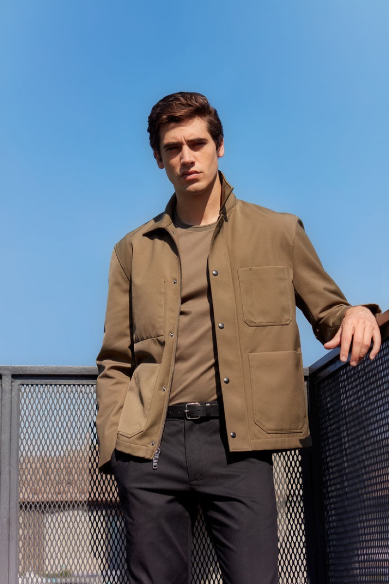 Marco Bellotti wears a bonded chore jacket in olive from Club Monaco’s fall 2024 collection.