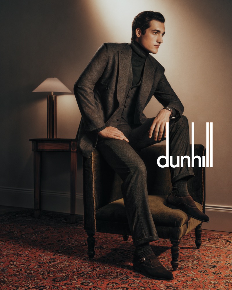 Adam Sattrup dons a three-piece suit with a turtleneck for Dunhill’s fall-winter 2024 campaign.