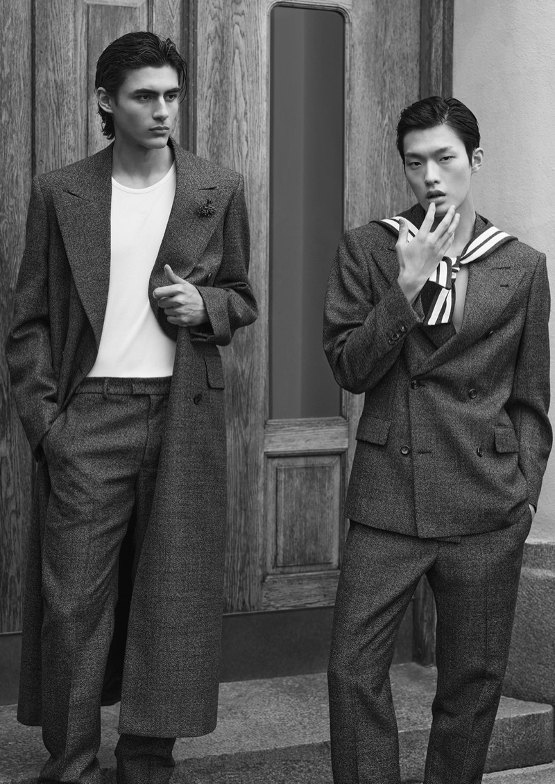 Emporio Armani showcases its updated fall tailoring on models Akbar Shamji and Hong Seong Jun.