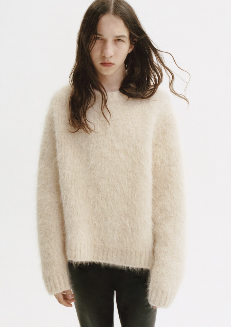 Sporting a cozy knit, Lux Gillespie appears in H&M’s fall-winter 2024 campaign.