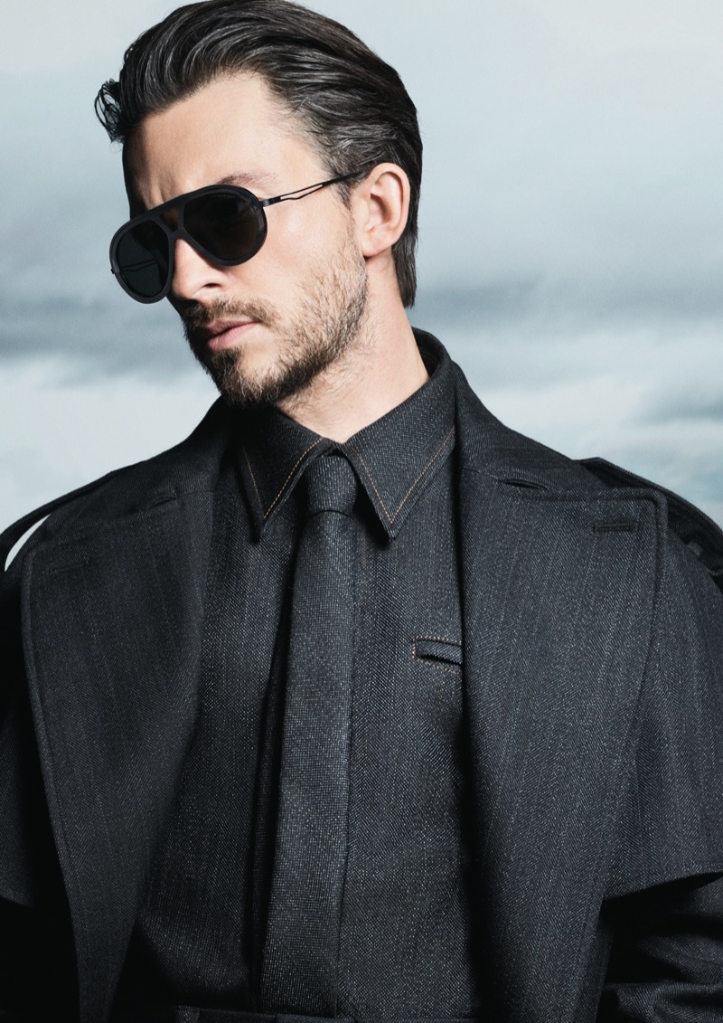 English actor Jonathan Bailey dons navigator sunglasses for Emporio Armani’s fall-winter 2024 eyewear campaign.