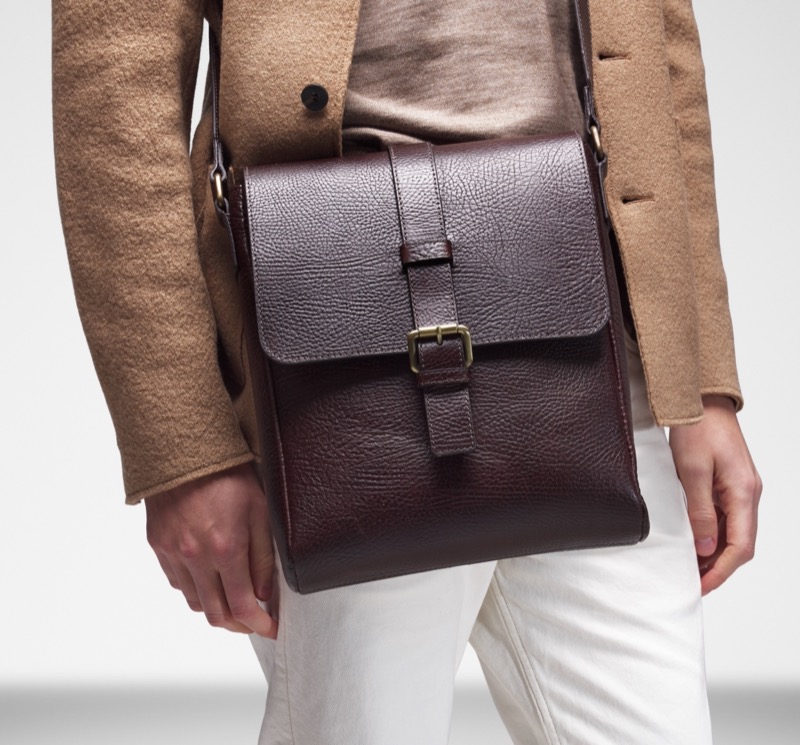 A leather messenger bag offers refinement on the go. 