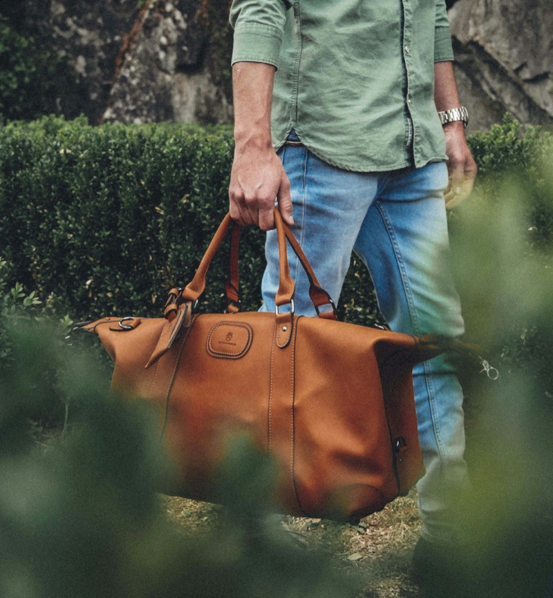 Style on the go is elevated with the leather weekender bag.