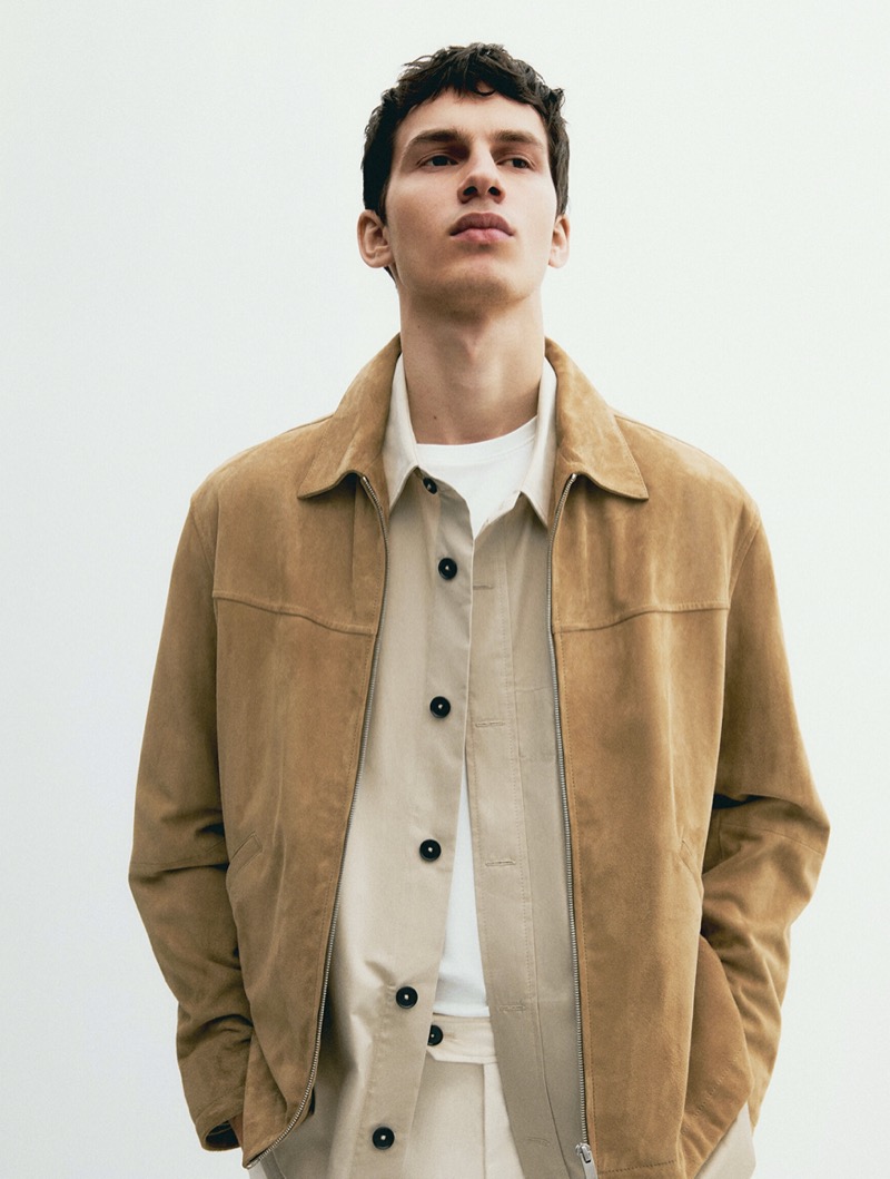 Kaplan Hani sports a suede jacket with an overshirt from Massimo Dutti.