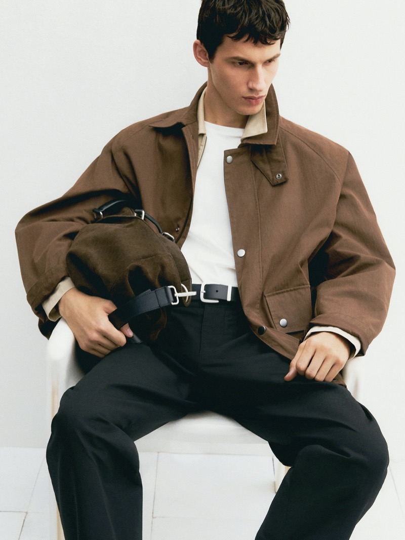 Massimo Dutti captures fall style in a brown cotton jacket layered with smart casual styles. 