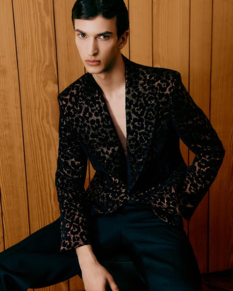 Habib Masovic embraces bold style in a leopard print tuxedo jacket by Tom Ford. 