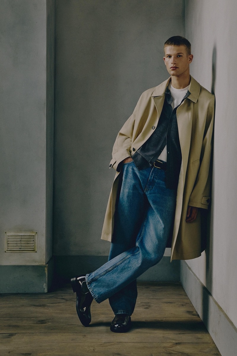 Teun van Stein wears a trench with distressed denim jeans from Zara’s pre-fall 2024 collection.