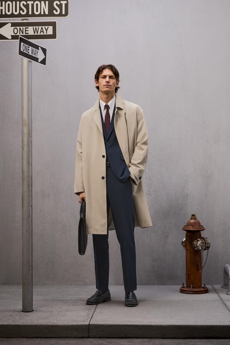 The car coat takes the spotlight, worn with a sharp suit.