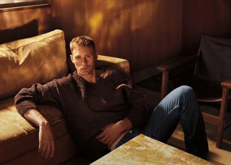 Alexander Skarsgård wears a V-neck sweater for Calvin Klein’s fall 2024 campaign.