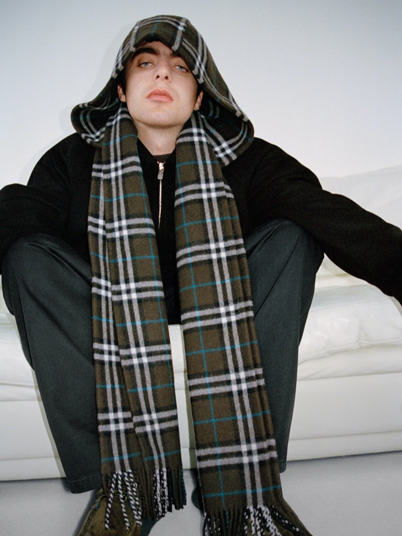 The Burberry check takes the spotlight as Lennon Gallagher dons the classic motif for fall.