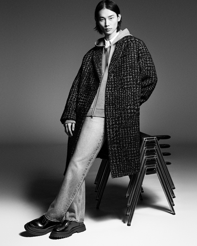 Taemin Park wears a houndstooth bouclé overcoat from COS’ fall-winter 2024 collection.