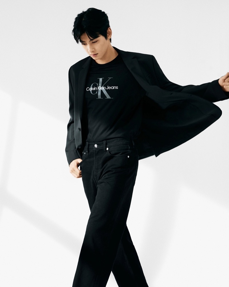 Cha Eun-woo stars wears a Calvin Klein monogram logo T-shirt for the brand’s fall 2024 campaign. 