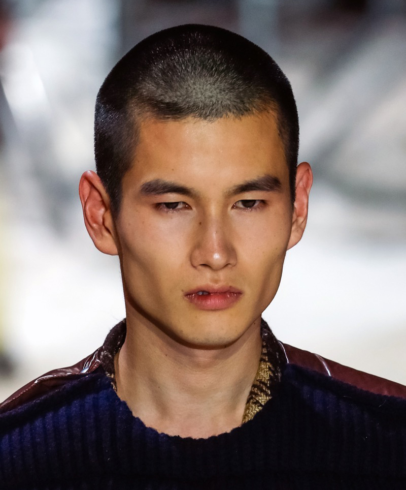 The classic buzz cut offers a timeless style that remains effortlessly sharp.