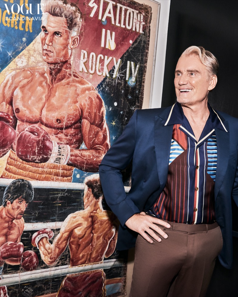 Dolph Lundgren poses against the backdrop of Rocky IV artwork for Vogue Scandinavia.