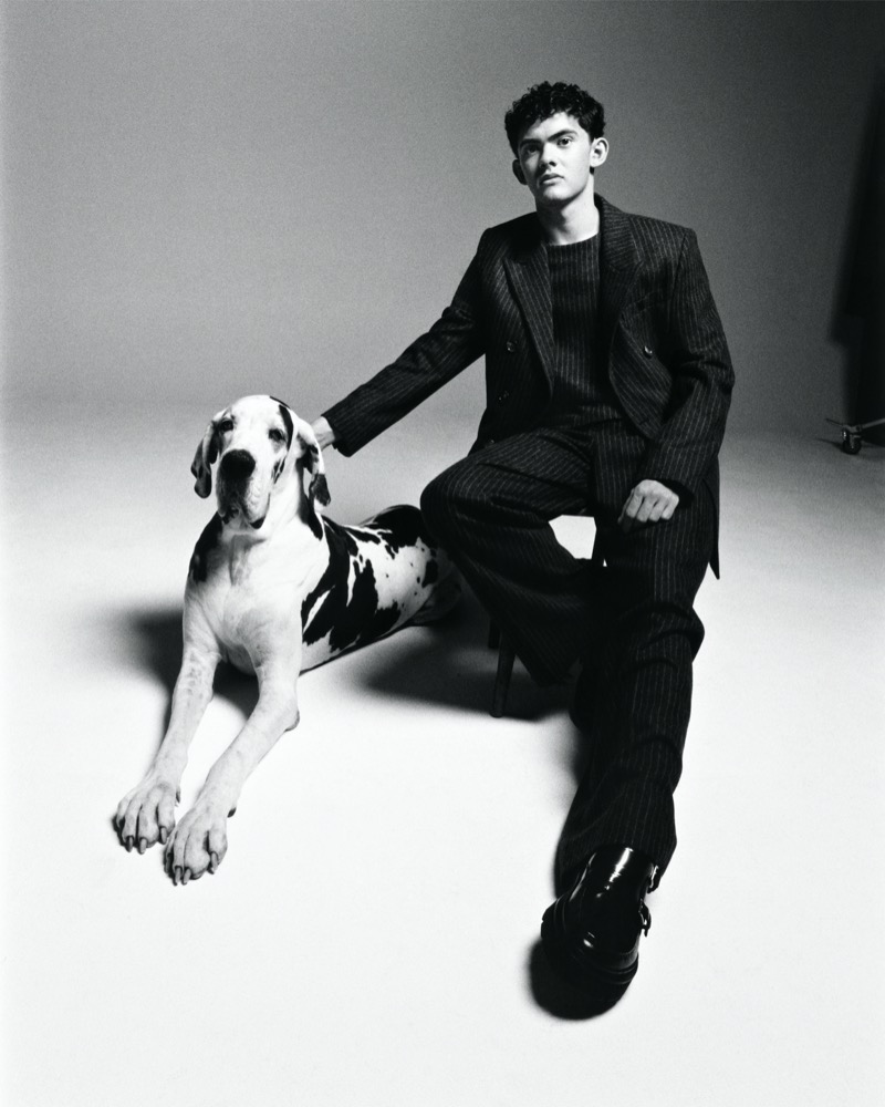 Joe Locke poses with a German mastiff for AMI’s fall-winter 2024 campaign.