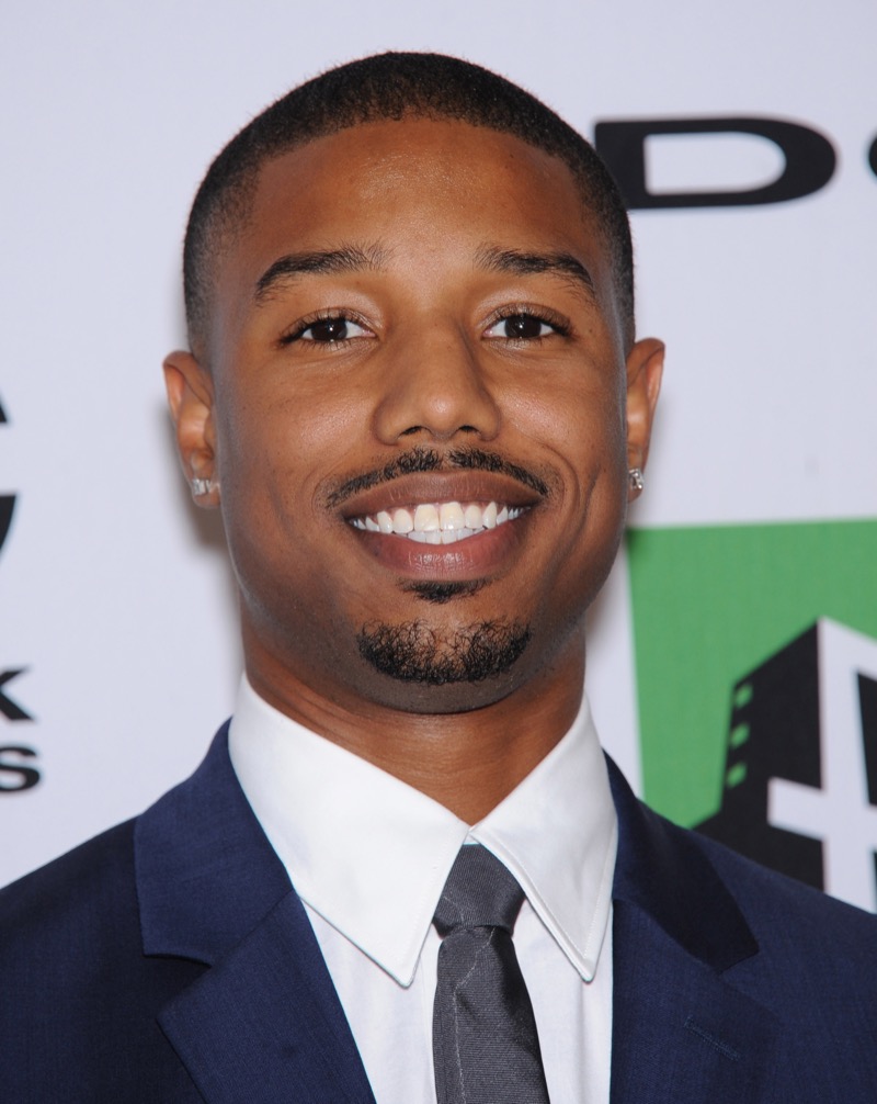 Michael B. Jordan’s buzz cut with a low taper fade delivers a classic, polished look. 