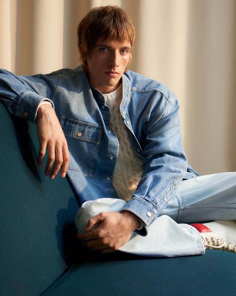 Model Samuel Curtis goes casual in a Bottega Veneta denim shirt and Our Legacy jeans.