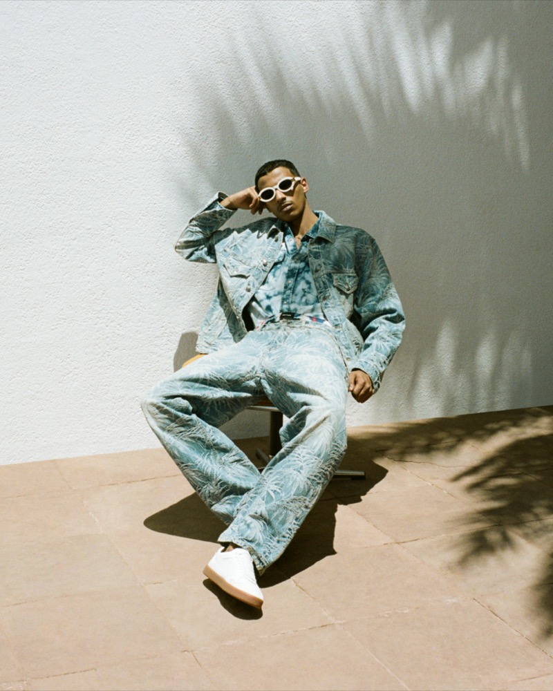 Sporting printed denim, Mohamed Hassan appears in Palm Angels’ fall-winter 2024 campaign.