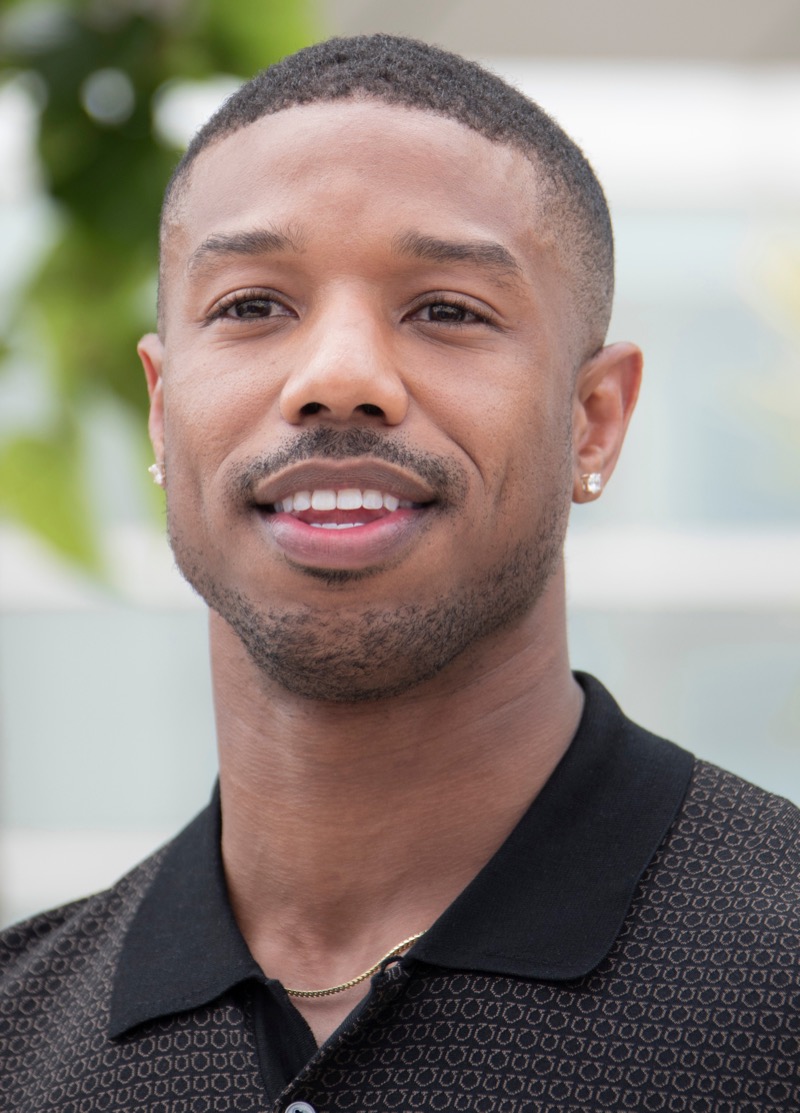 With its sharp lines around the temples, Michael B. Jordan’s temp fade buzz cut adds extra detail.