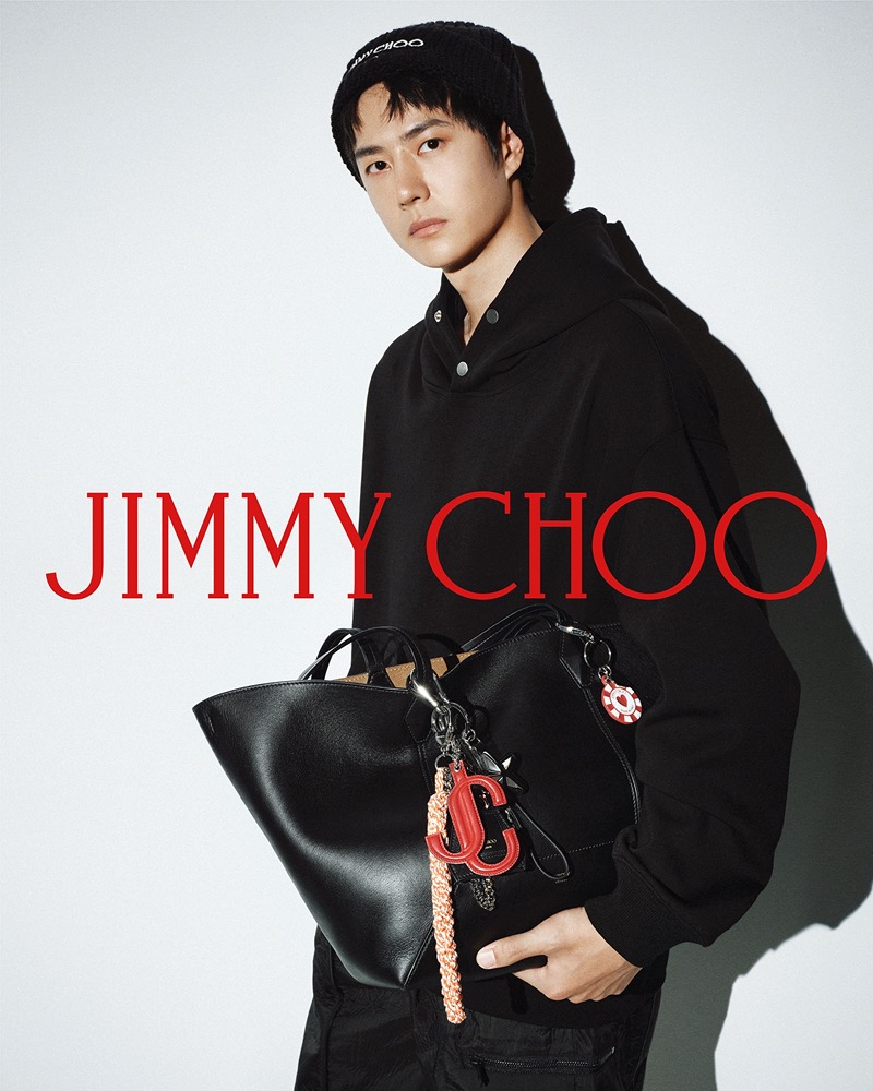 Wearing all black, Wang Yibo stars in the Jimmy Choo fall 2024 advertisement.