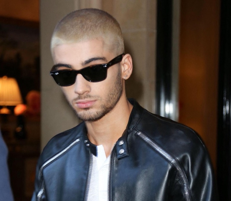 Zayn Malik’s platinum blonde buzz cut is a bold choice that perfectly complements his modern, edgy style.