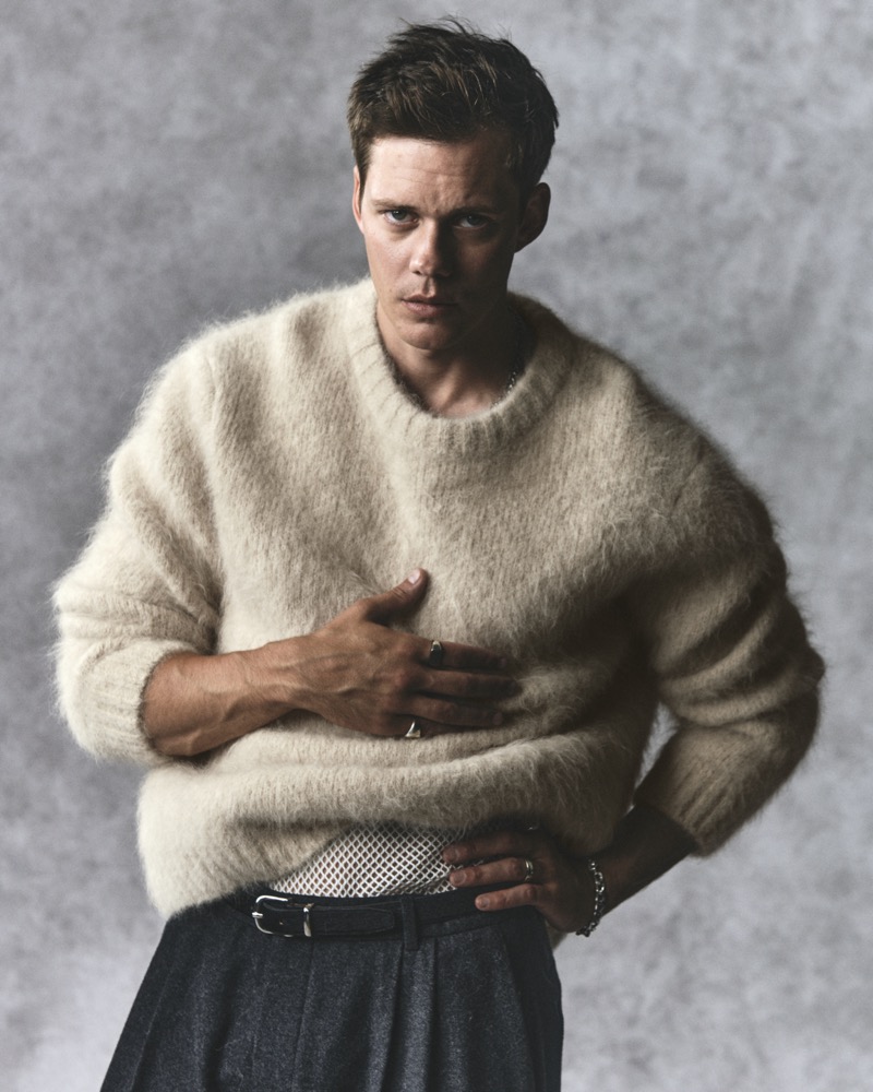 Actor Bill Skarsgård wears a cozy sweater for the H&M Atelier fall 2024 advertisement.