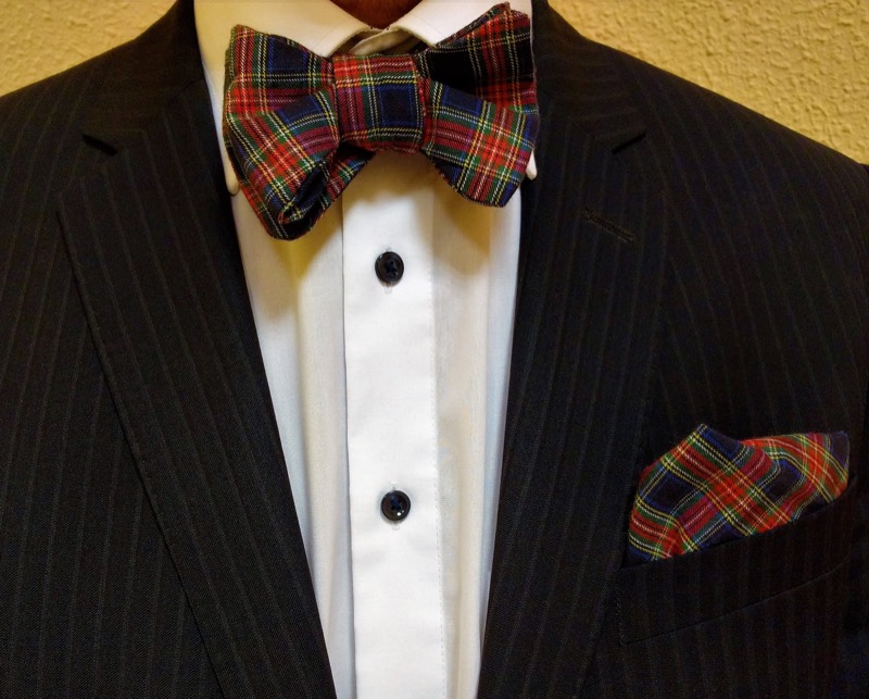 A tartan pocket square adds festive cheer to the classic suit.