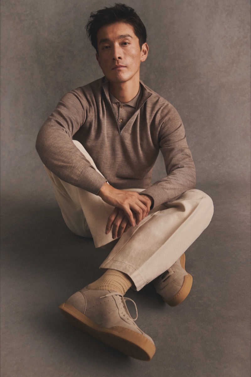 Daisuke Ueda models Eton’s 14-gauge fine-knit Tollegno Merino wool quarter-zip and polo.